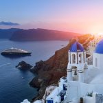 3D Blue domed churches at sunset, Oia, Santorini